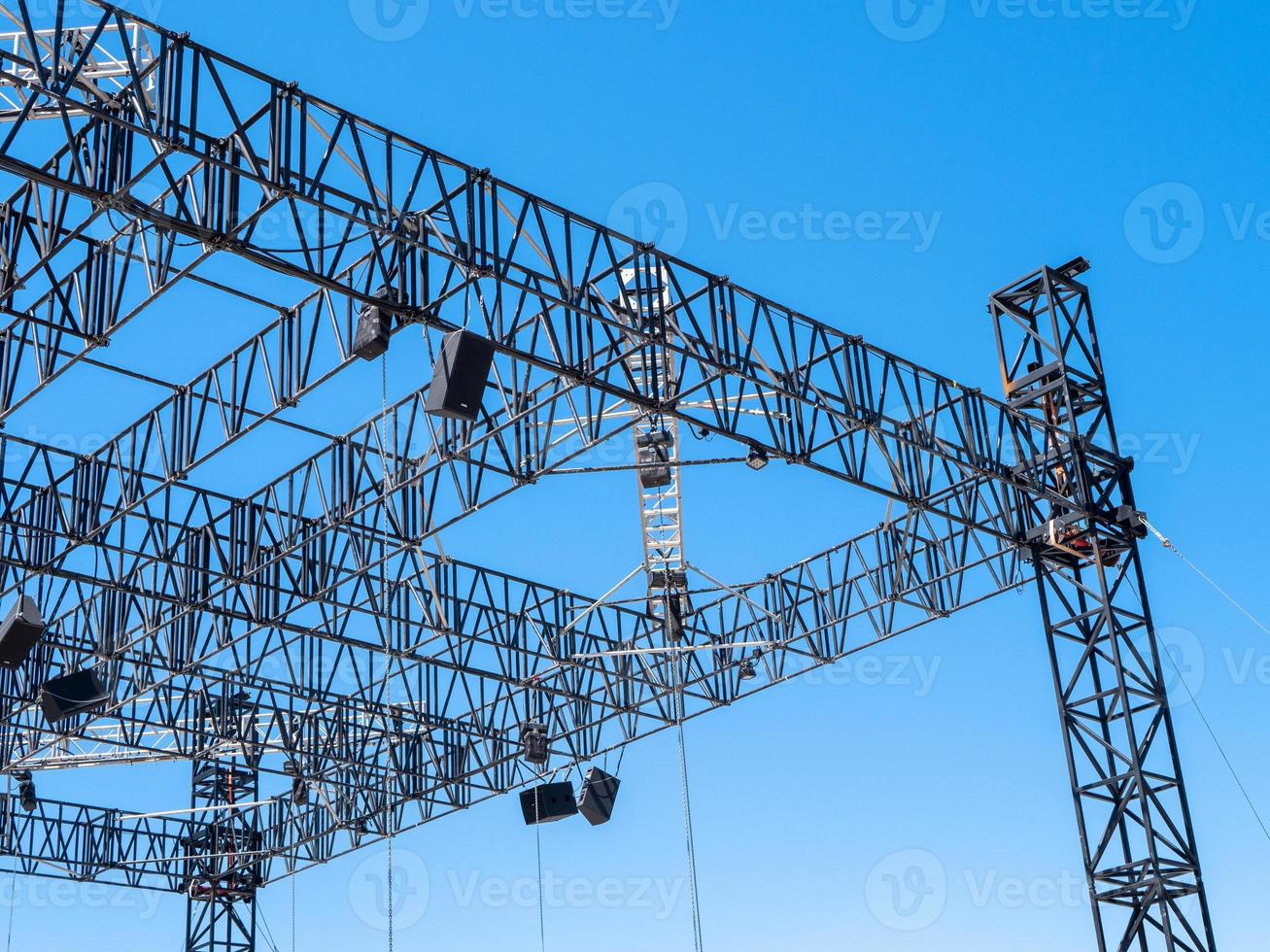 metal structures assembled into a scene against a blue sky photo