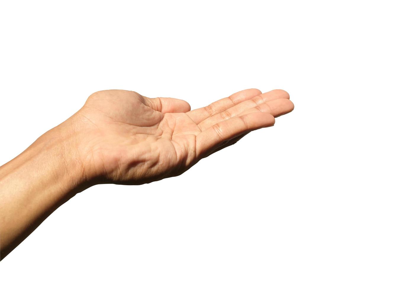 Young man  hand holding open palm up isolated on white background with clipping path for design. photo