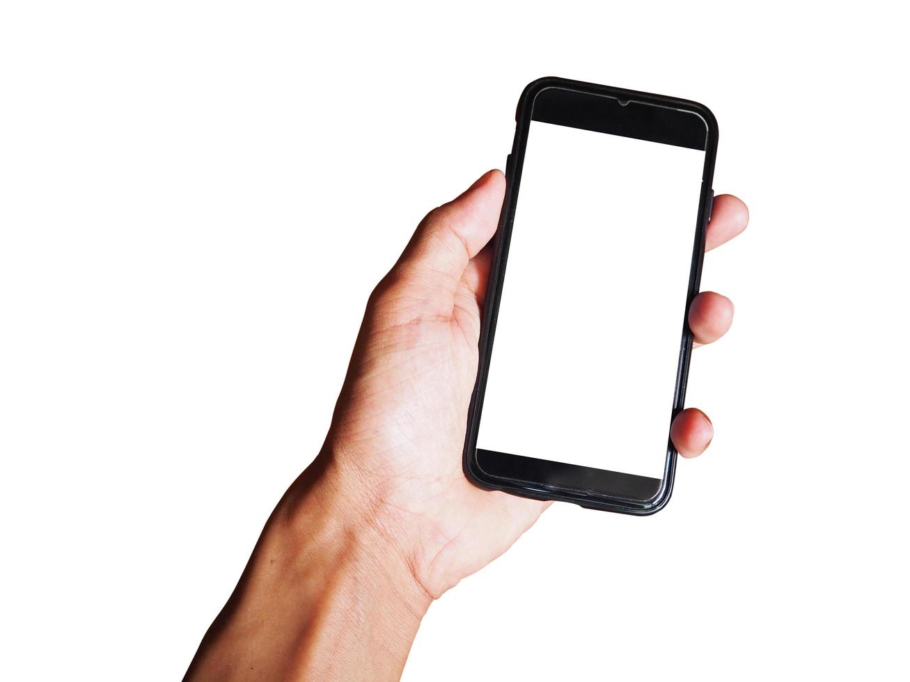 Young man hand holding black smartphone with blank screen isolated on white background. Space for text or design photo