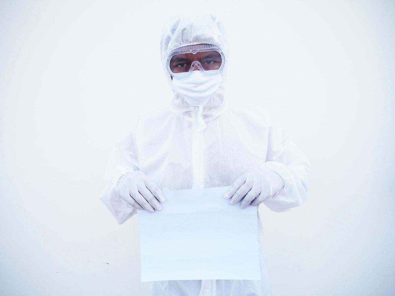 Young doctor or scientist in PPE suite uniform holding blank paper for text with both hands While looking ahead. coronavirus or COVID-19 concept isolated white background photo