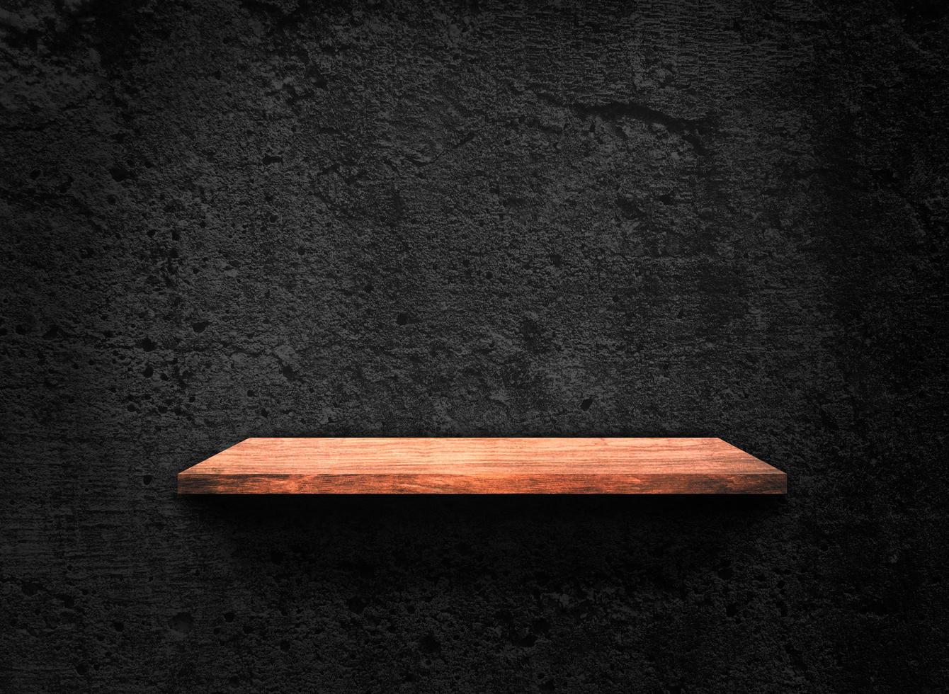 Blank of old wooden shelf on dark wall texture background with clipping path for design photo