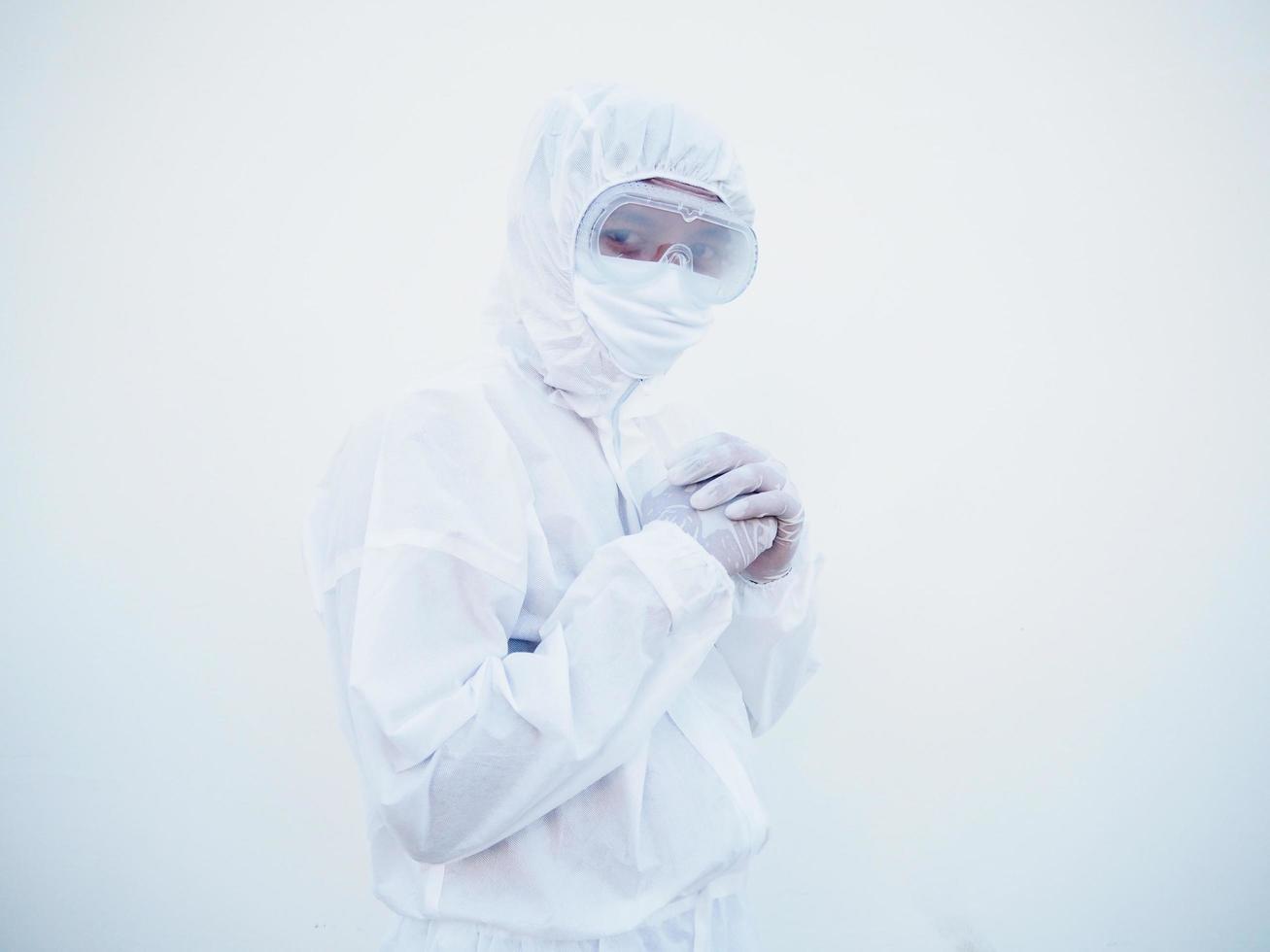 Portrait of confident asian male doctor or scientist in PPE suite uniform empty space deep thinking creative person  with looking ahead on white background. COVID-19 concept. photo