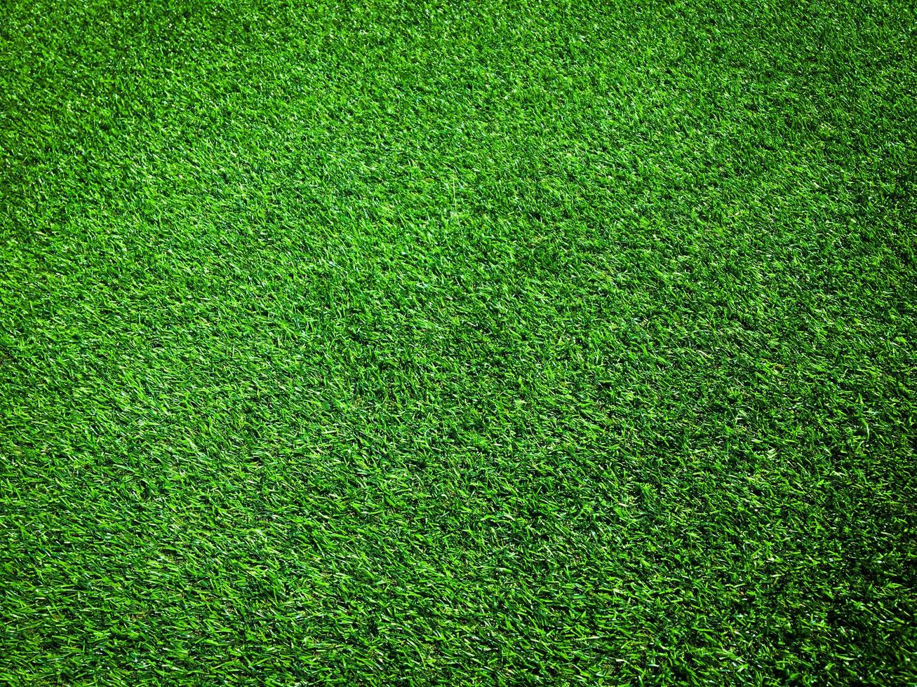 Artificial grass texture space background photo