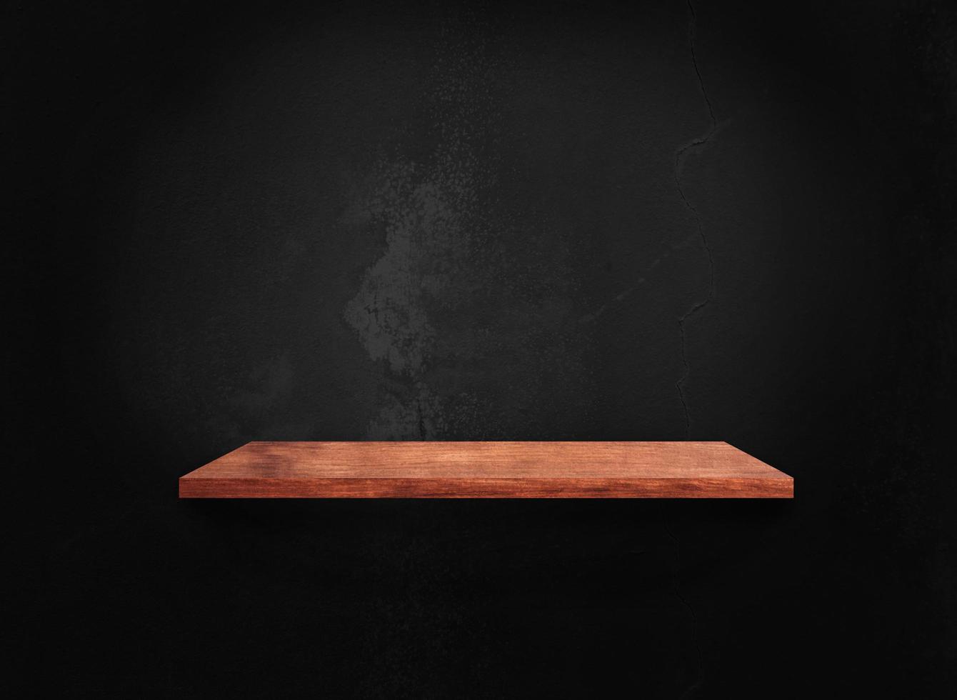 Blank of old wooden shelf on dark wall texture background with clipping path for design photo