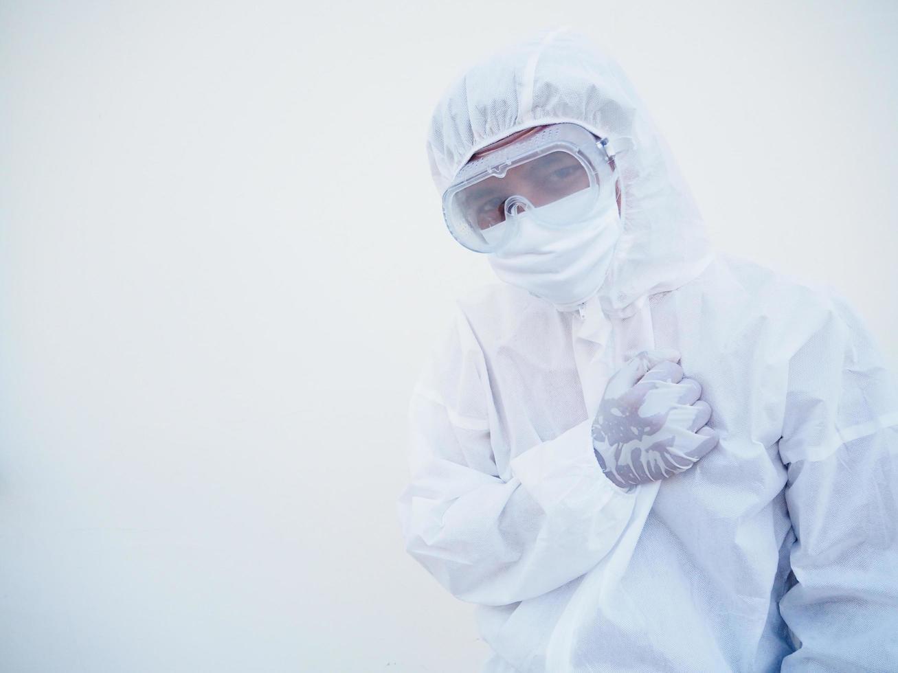 Asian male doctor or scientist in PPE suite uniform with wearing face mask protective. The mood is like sad and calm, coronavirus or COVID-19 concept isolated white background photo