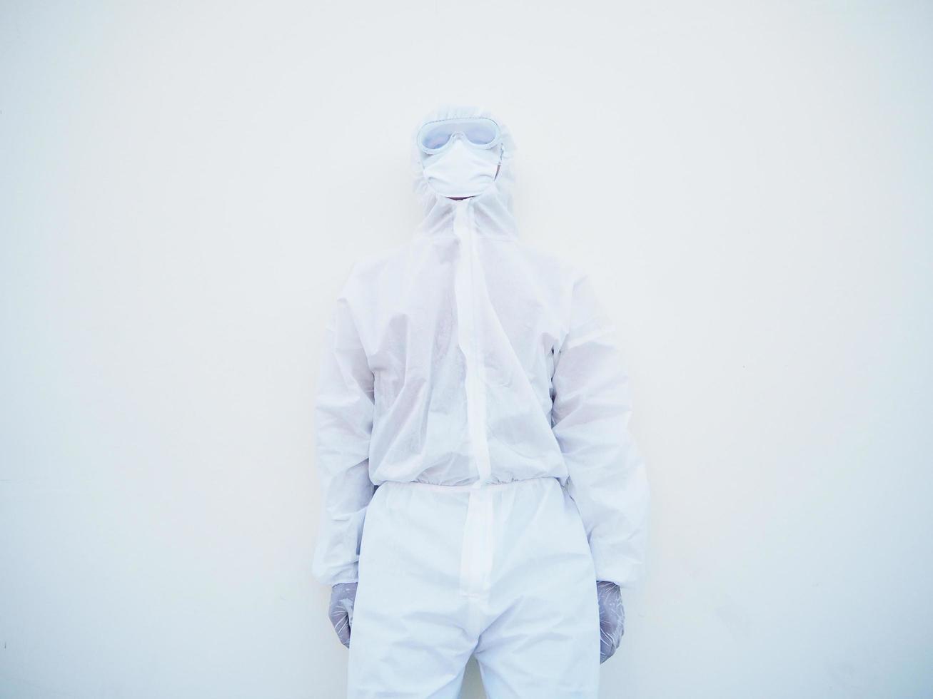 Asian male doctor or scientist in PPE suite uniform with wearing face mask protective. The mood is like sad and calm, coronavirus or COVID-19 concept isolated white background photo