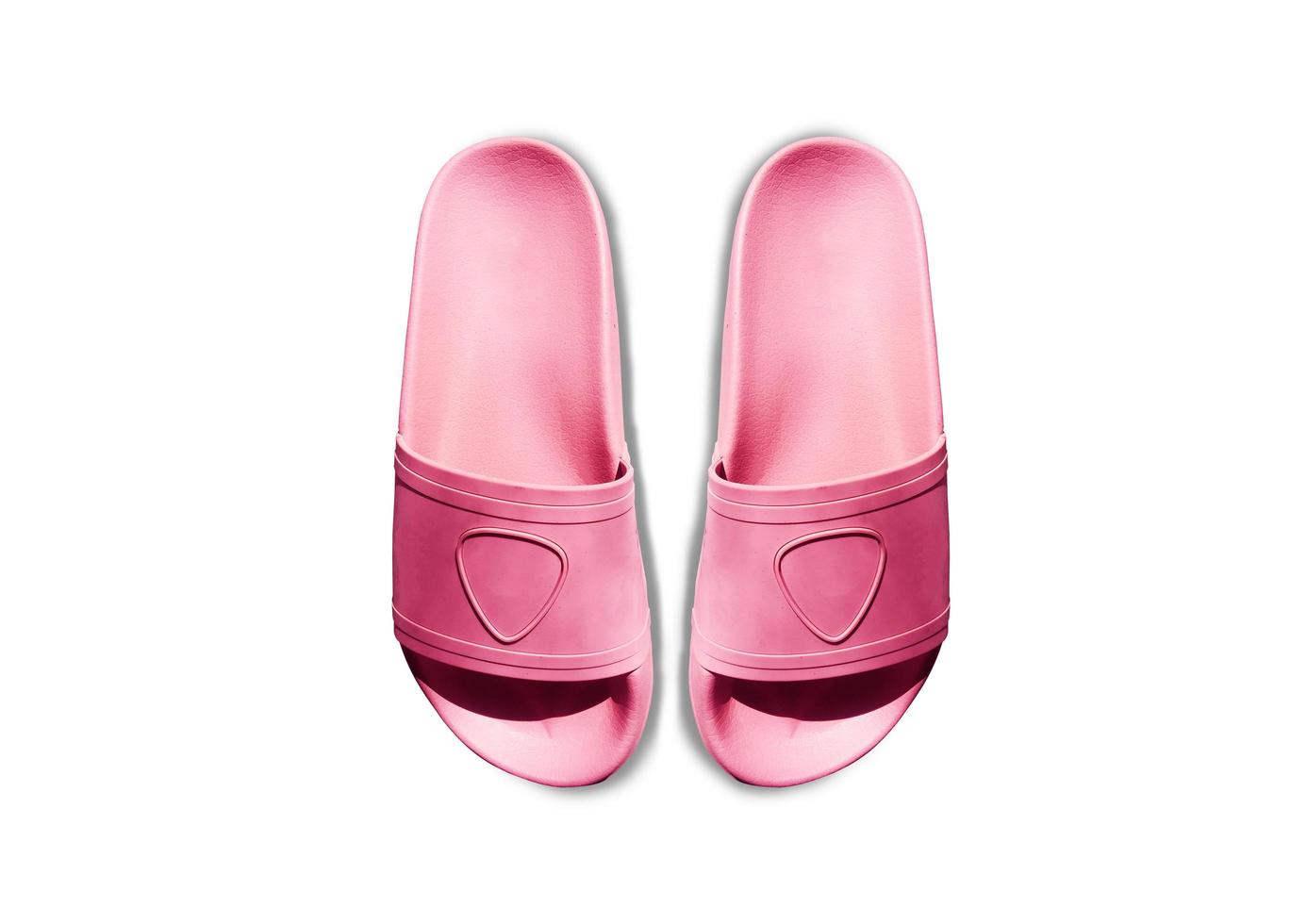 Pink rubber slipper isolated on white background. clipping path photo