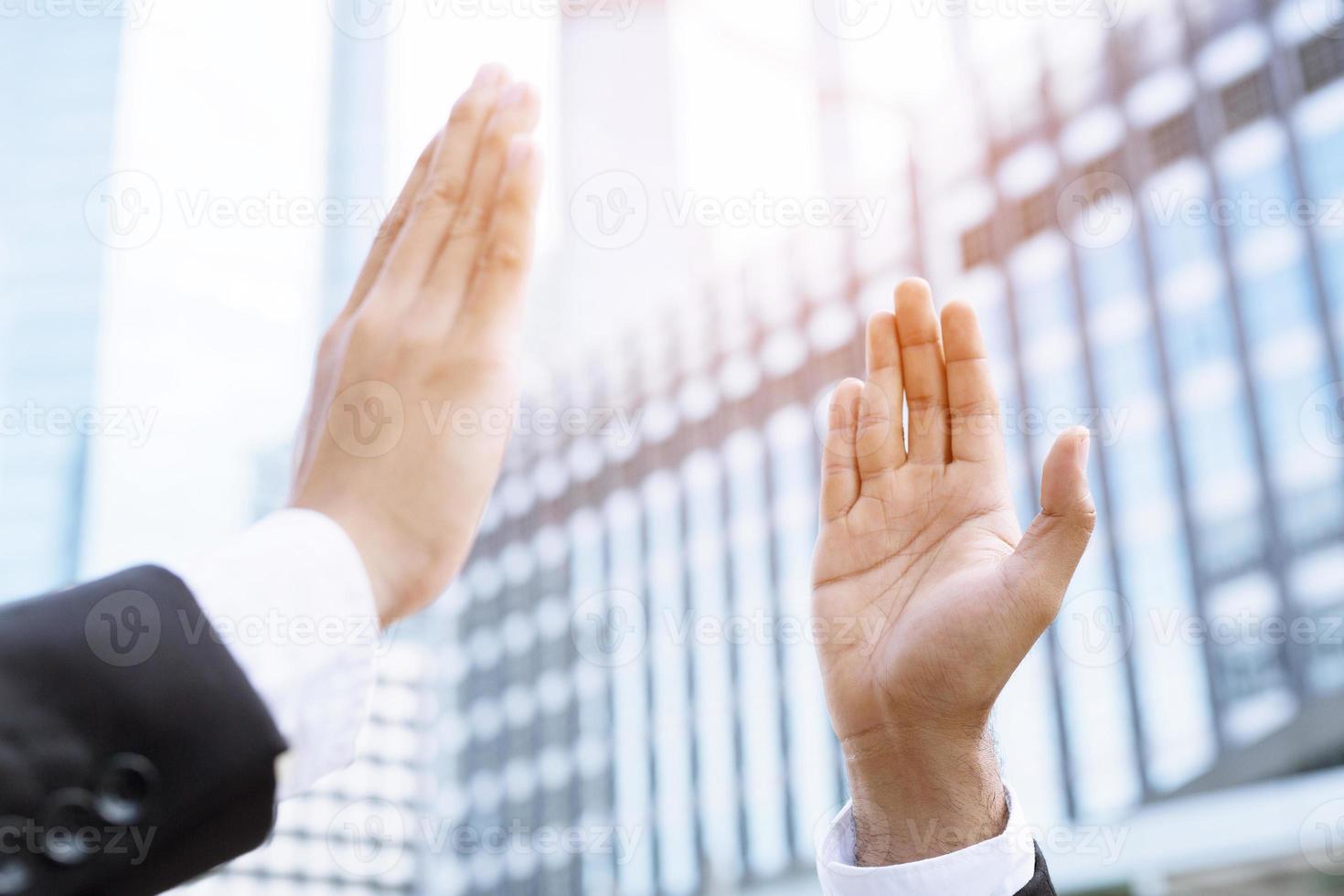 Audience applauding at a business appreciation. People congratulation and clapping hands at conference and presentation. photo