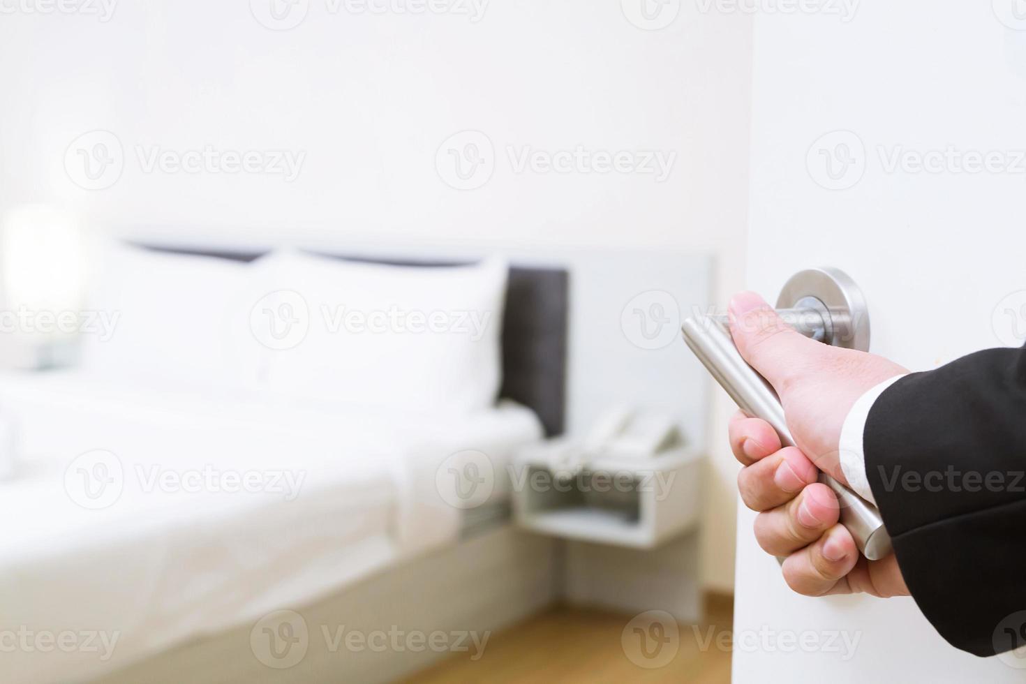 close up showing hand of receptionist opening hotel room , Welcome guests to the hotel. photo