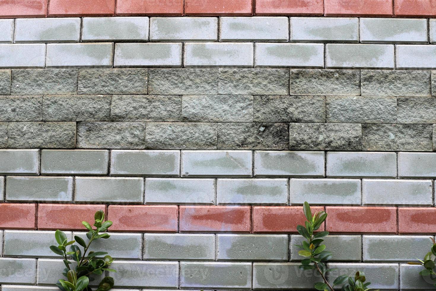 High wall made of stone and concrete. photo