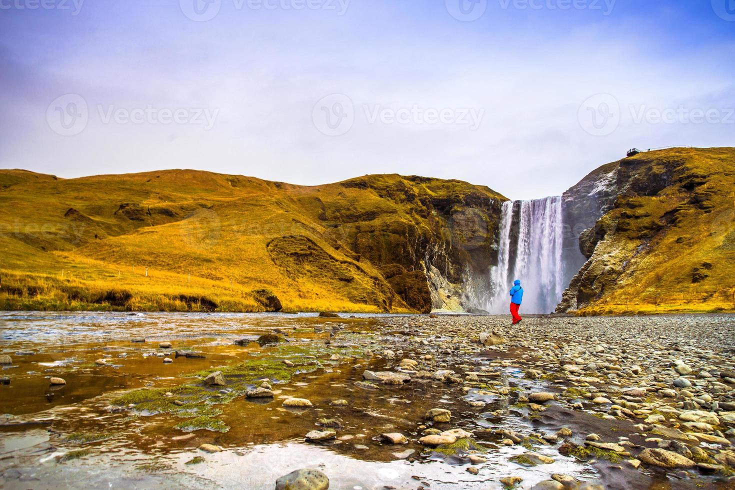 Skogafoss, a waterfall situated on the Skoga River in the south of Iceland at the cliffs of the former coastline photo