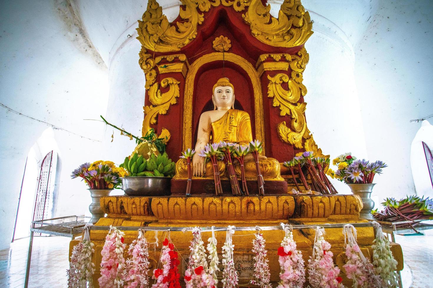 Mingun, Sagaing Region, Myanmar - January 8, 2019 - Buddha image in Hsinbyume Pagoda, or Myatheindan Pagoda, the real image is preserve behind the fake one photo