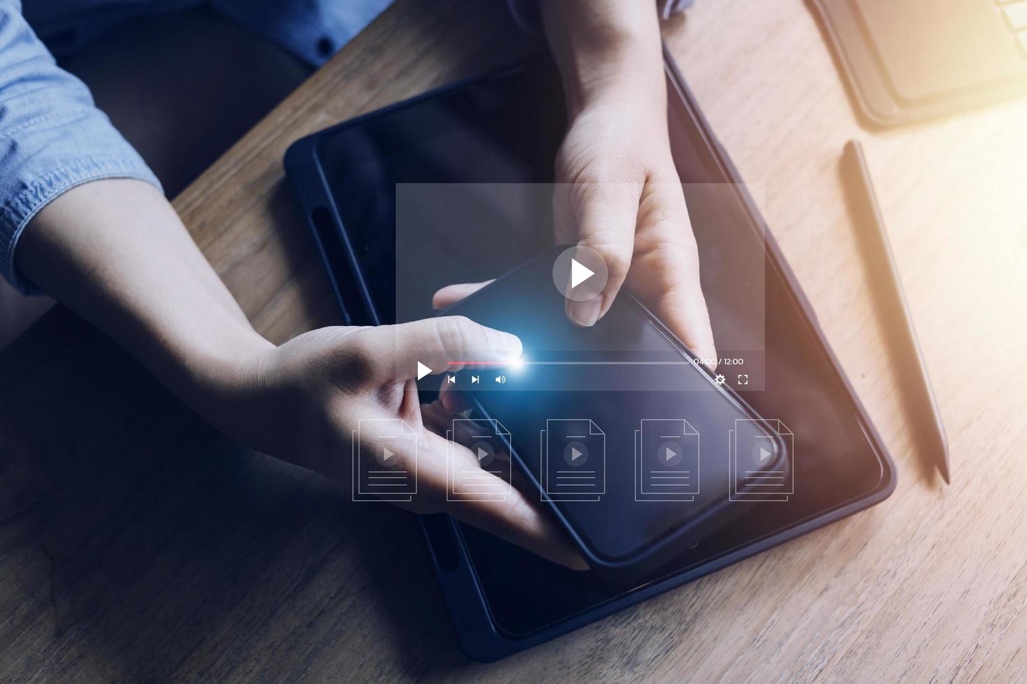 man using mouse and keyboard for streaming online, watching video on internet, live concert, show or tutorial photo