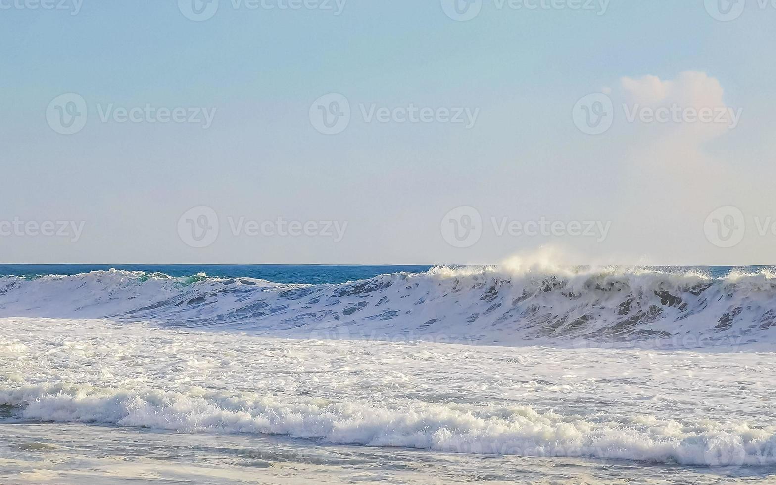 Extremely huge big surfer waves at beach Puerto Escondido Mexico. photo