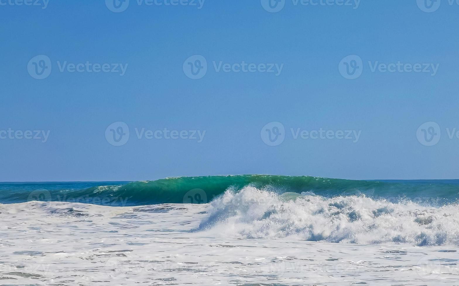 Extremely huge big surfer waves at beach Puerto Escondido Mexico. photo