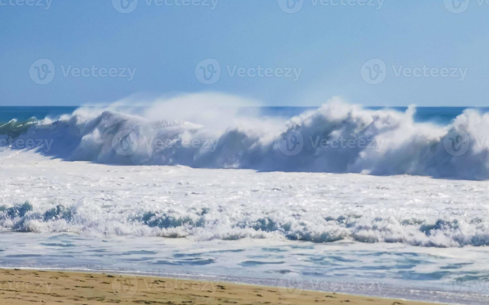 Extremely huge big surfer waves at beach Puerto Escondido Mexico. photo