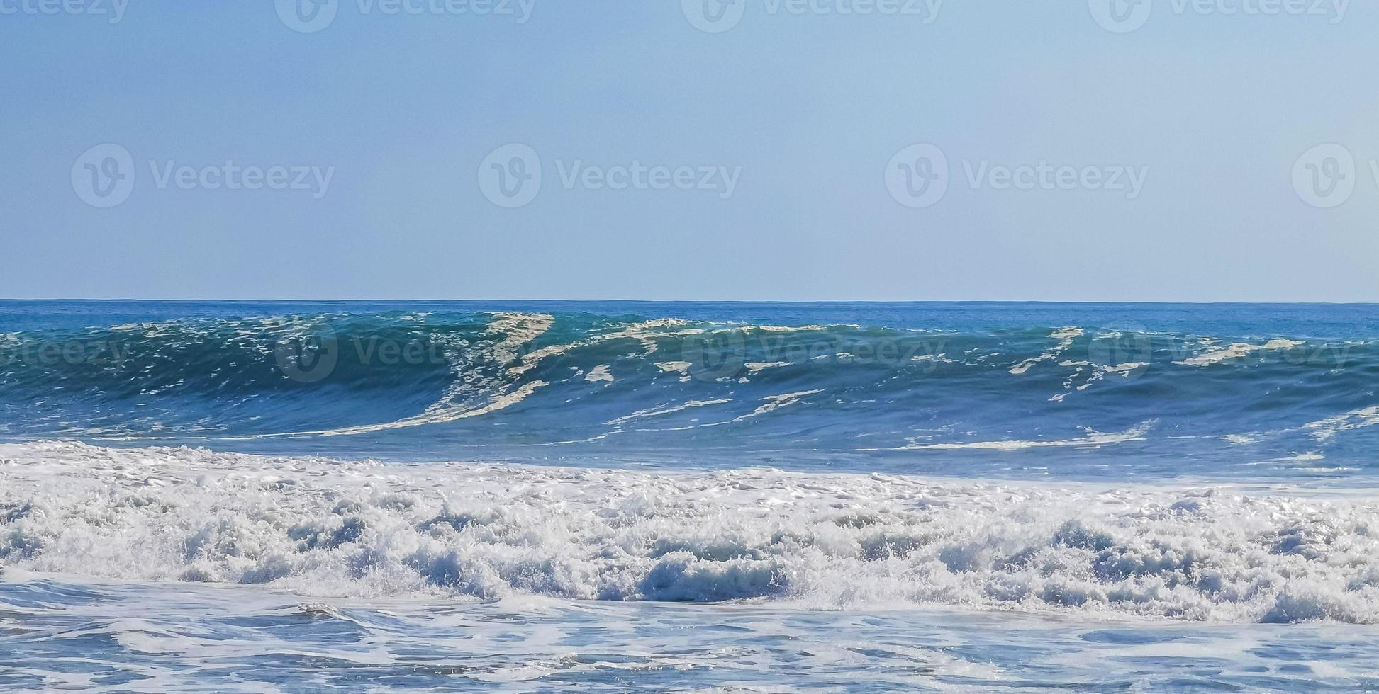 Extremely huge big surfer waves at beach Puerto Escondido Mexico. photo