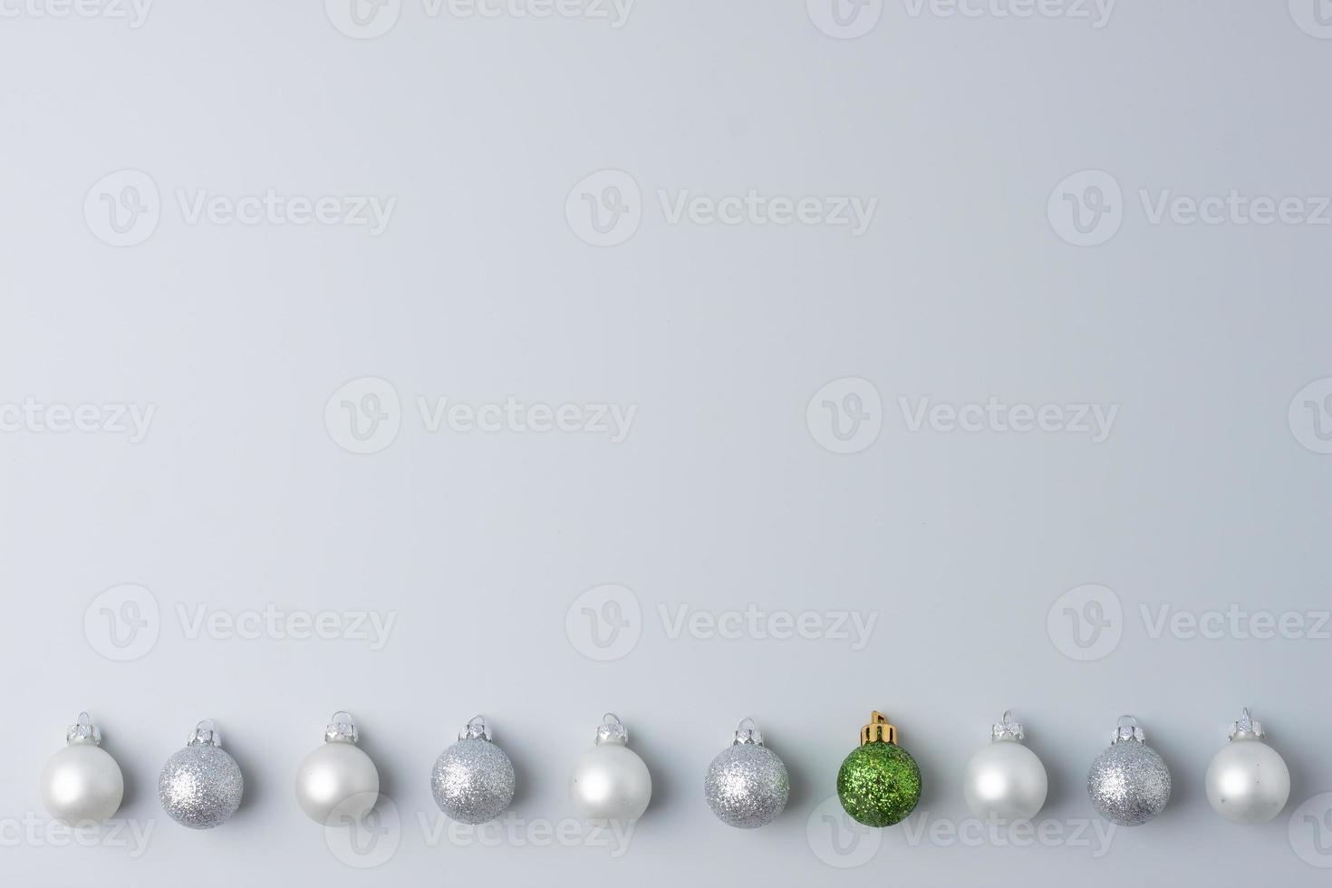 Christmas grey minimal background with grey ball. Flat lay, copy space photo