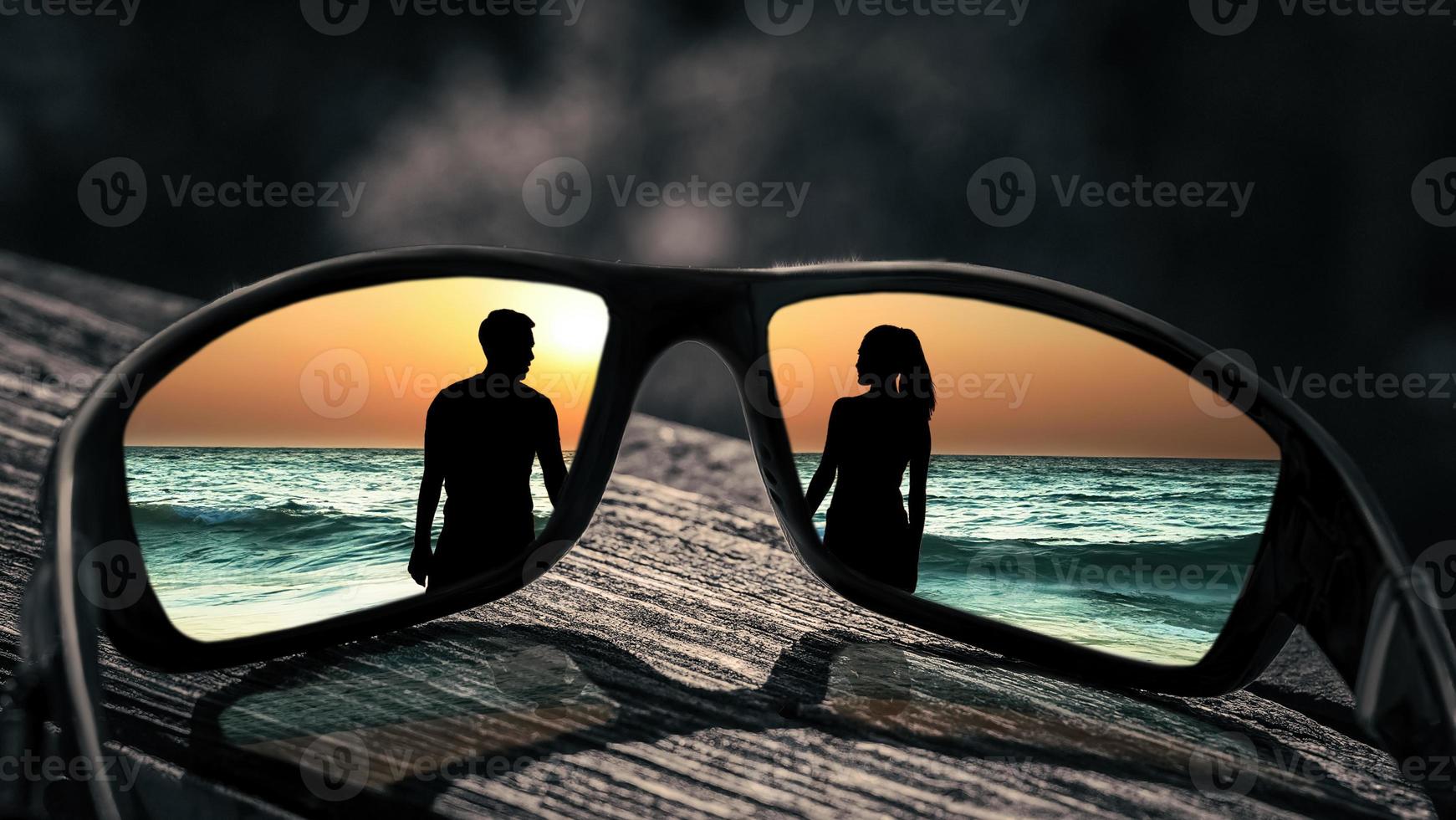 silhouettes of a man and a woman with glasses photo