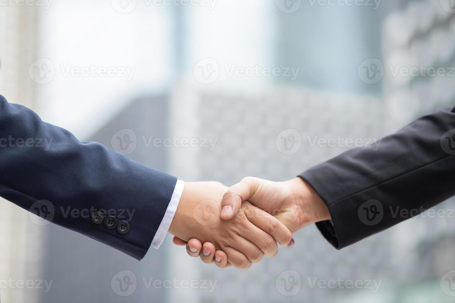 Business shake hands Buy a new business For the company's growth photo