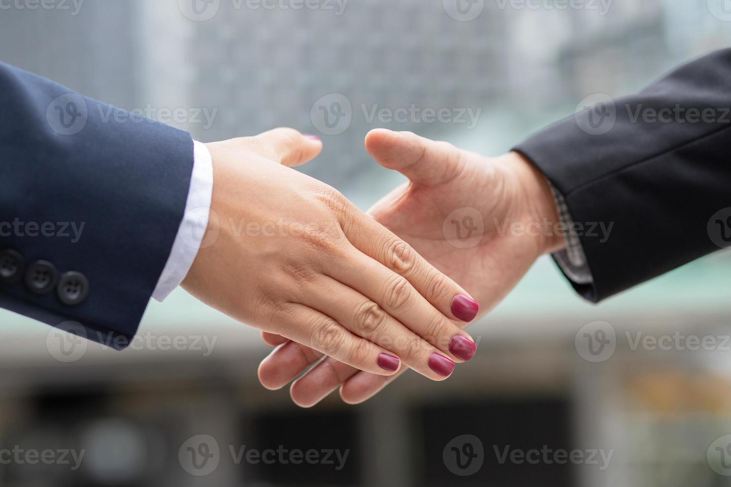Business shake hands Buy a new business For the company's growth photo