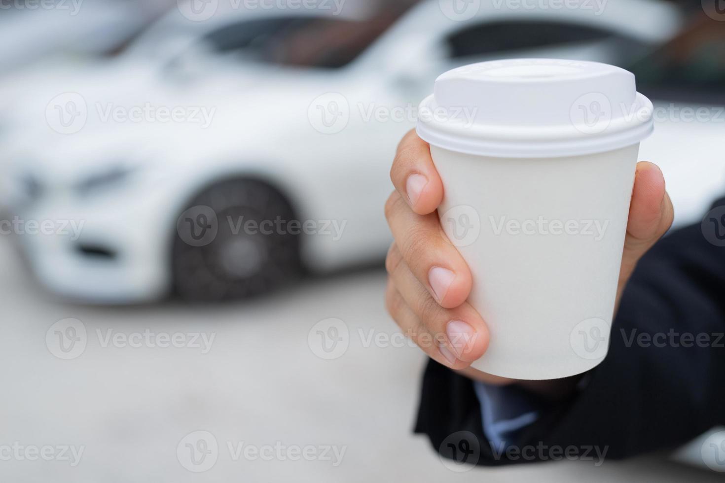Businessmen are drinking hot coffee before leaving to work at the office every time. photo