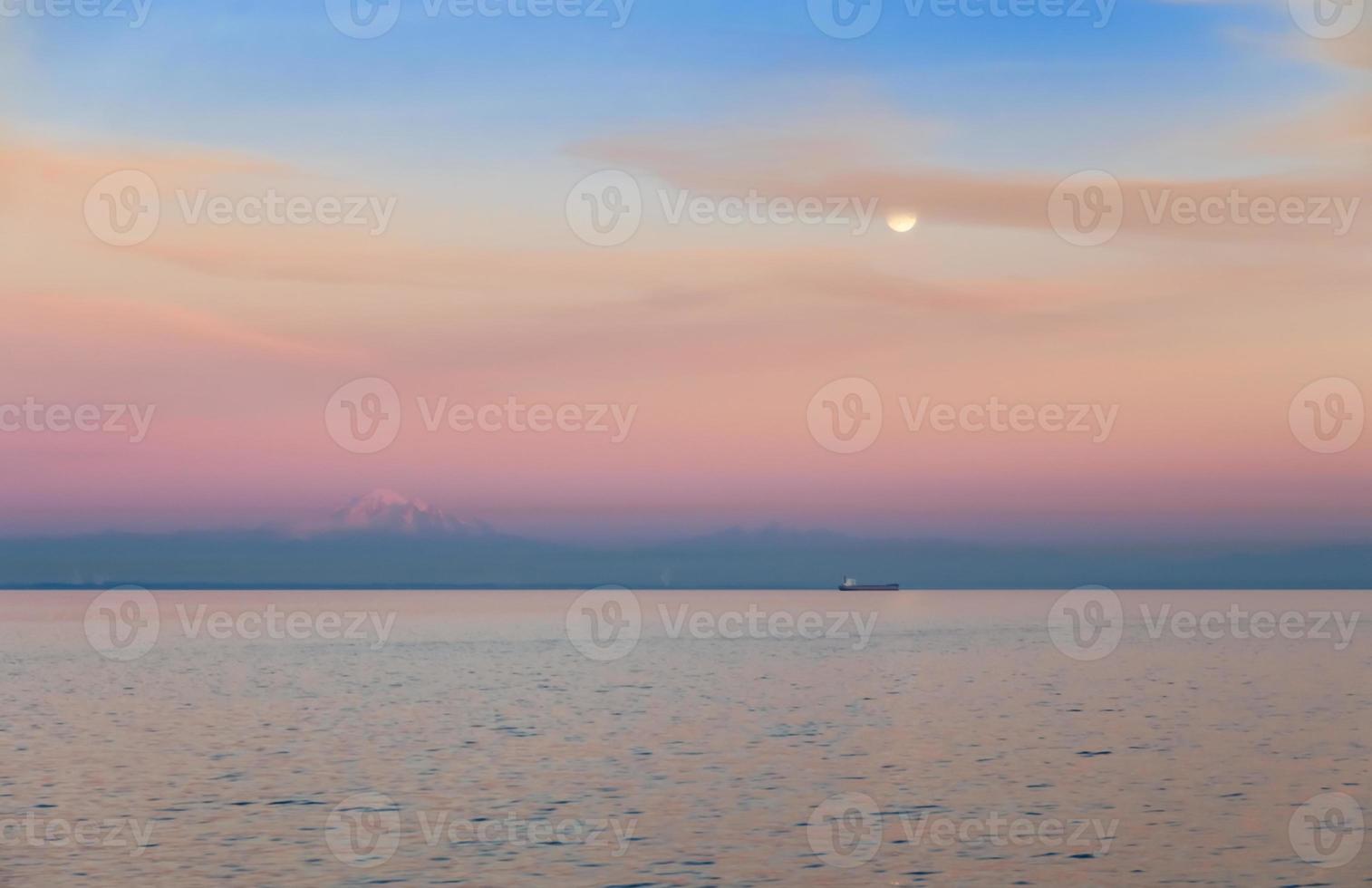 Sunset skyline of seascape with mountain in the background, Vancouver, British Columbia, Canada photo