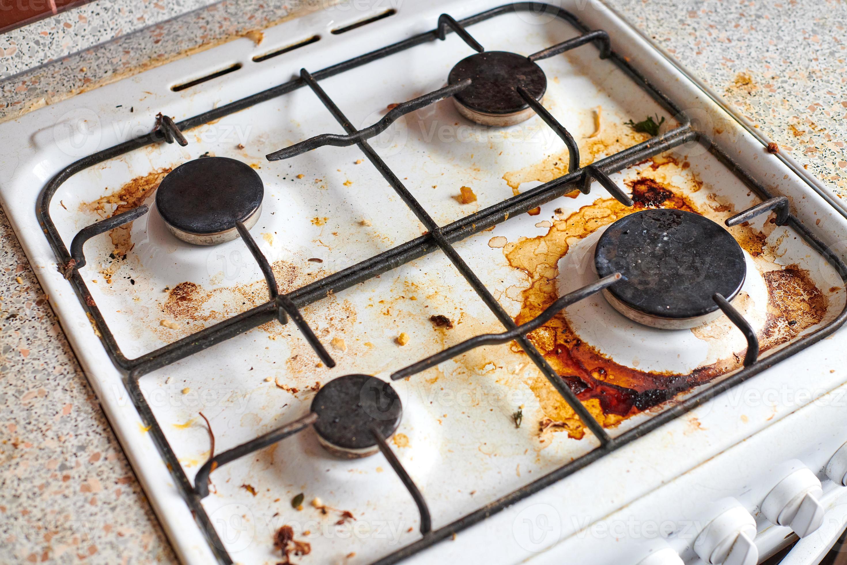 Dirty stove with food leftovers 12799792 Stock Photo at Vecteezy
