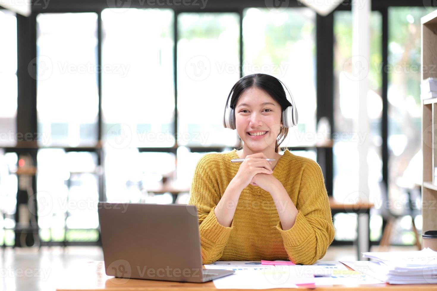 Asian girl student online learning class study online video call zoom teacher, Happy asian girl learn english language online with computer laptop. photo