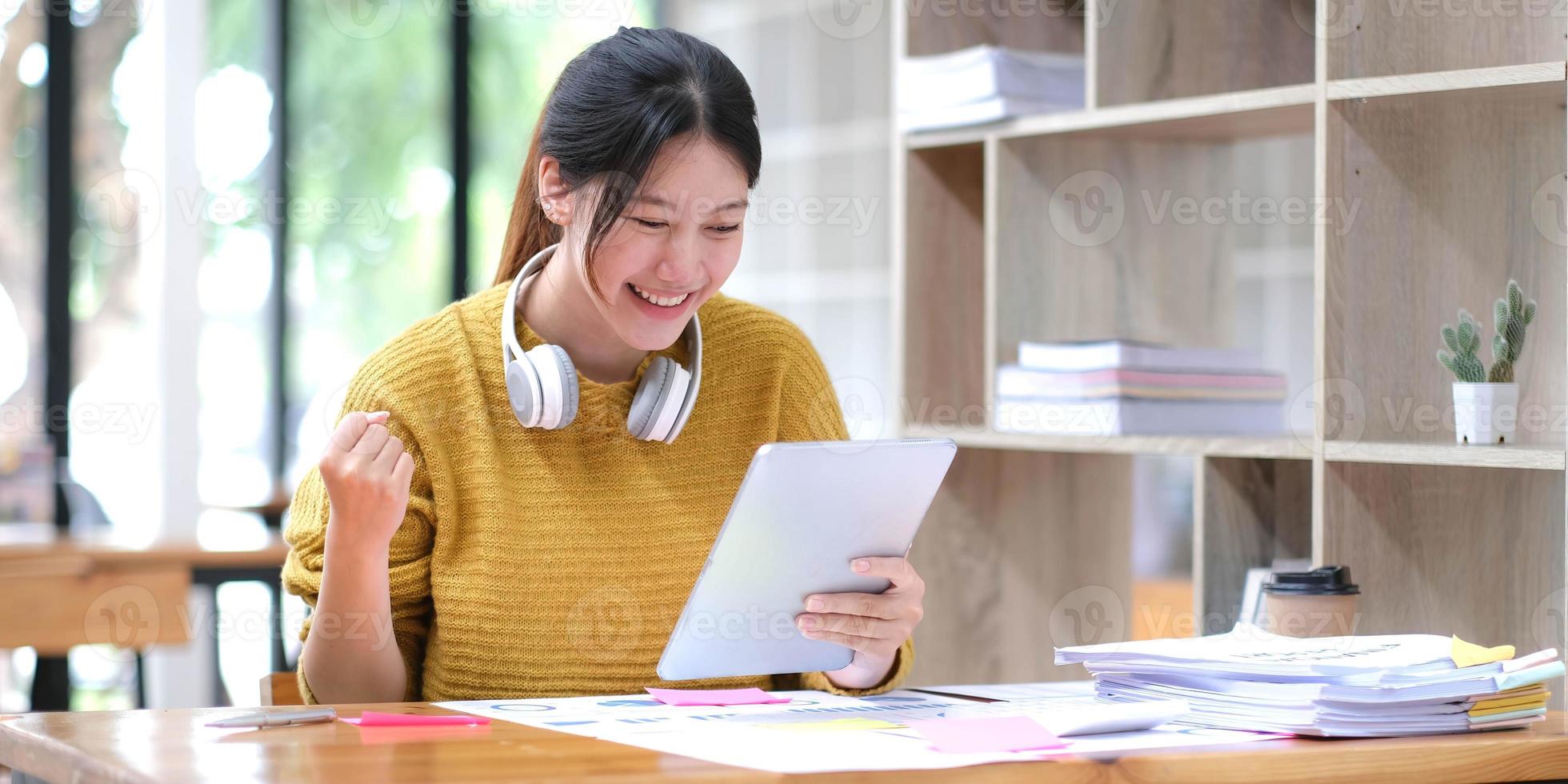 Asian girl student online learning class study online video call zoom teacher, Happy asian girl learn english language online with computer laptop. photo