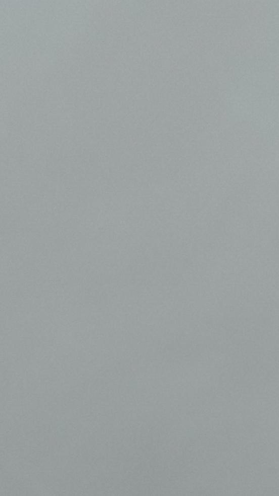 grey smooth surface bright soft cement wall background material texture mock up for design arts as presentation, simple banner ads wallpaper concept stock photo