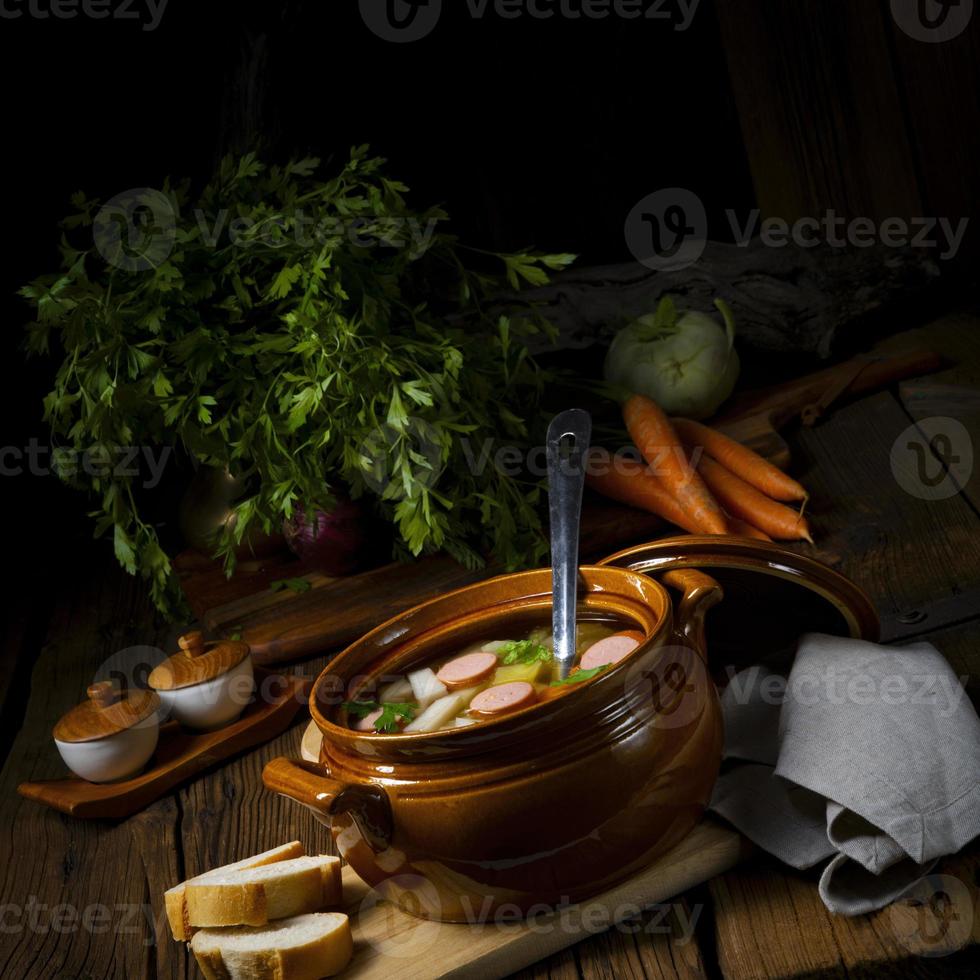 Potato kohlrabi soup with bockwurst photo