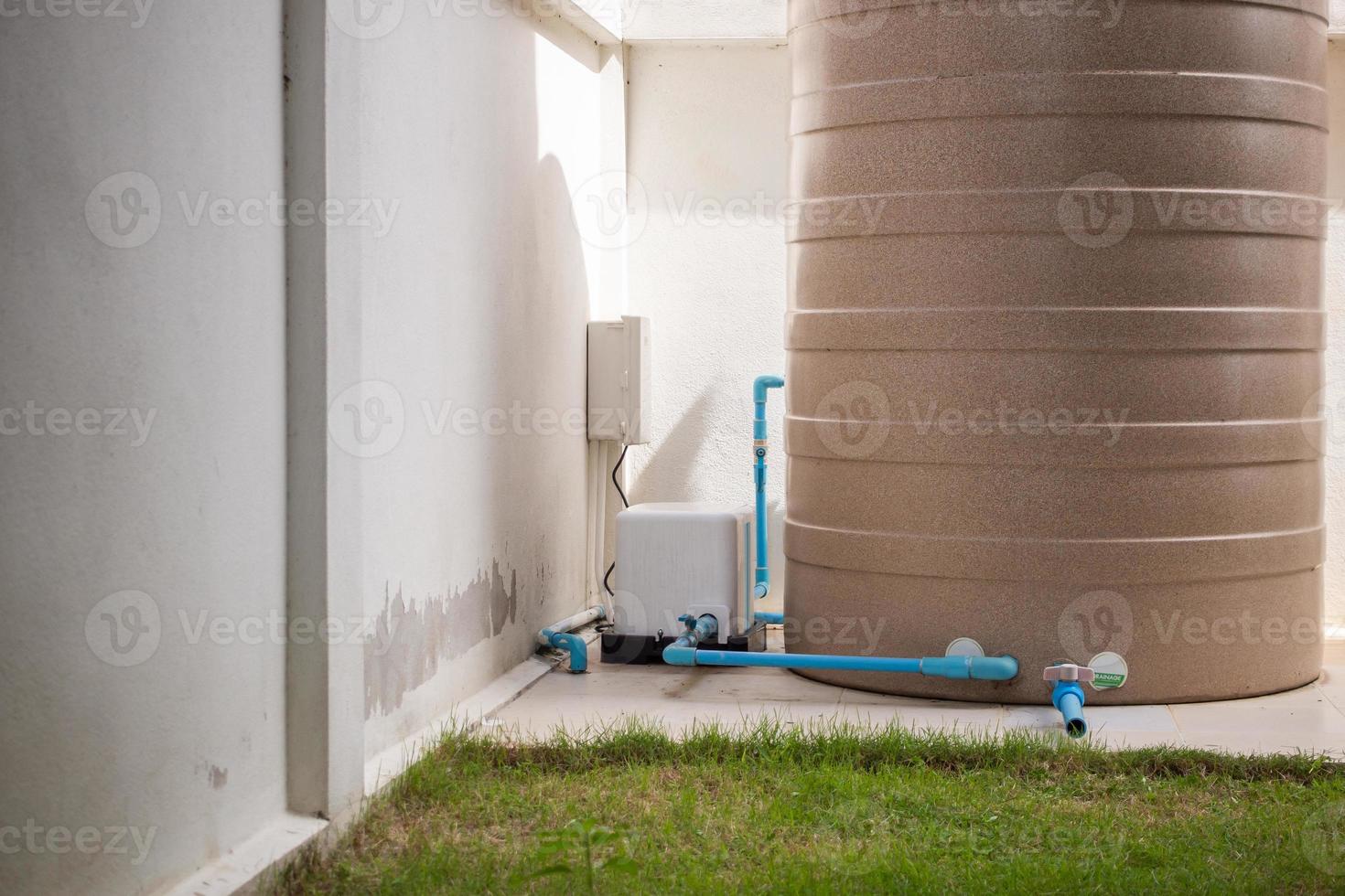 automatic water pump station outside the house photo