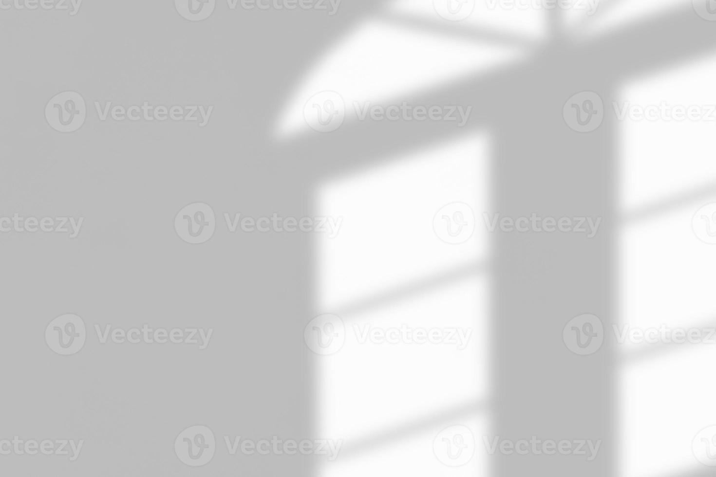 Window shadow drop on white wall background photo