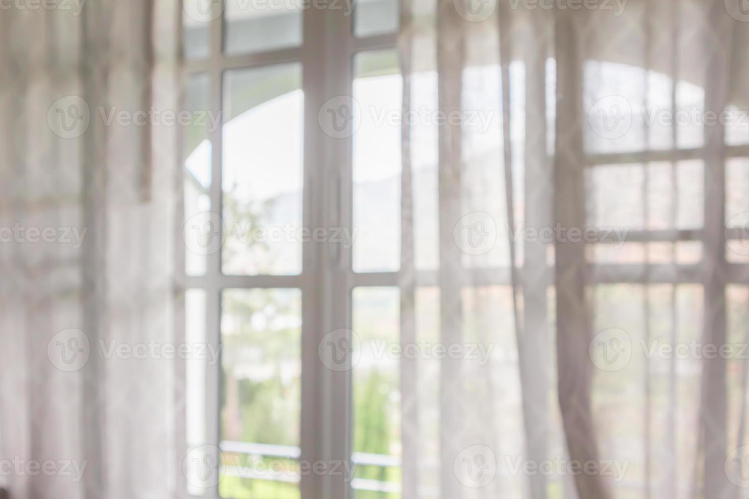 window curtain with green garden abstract blur background photo