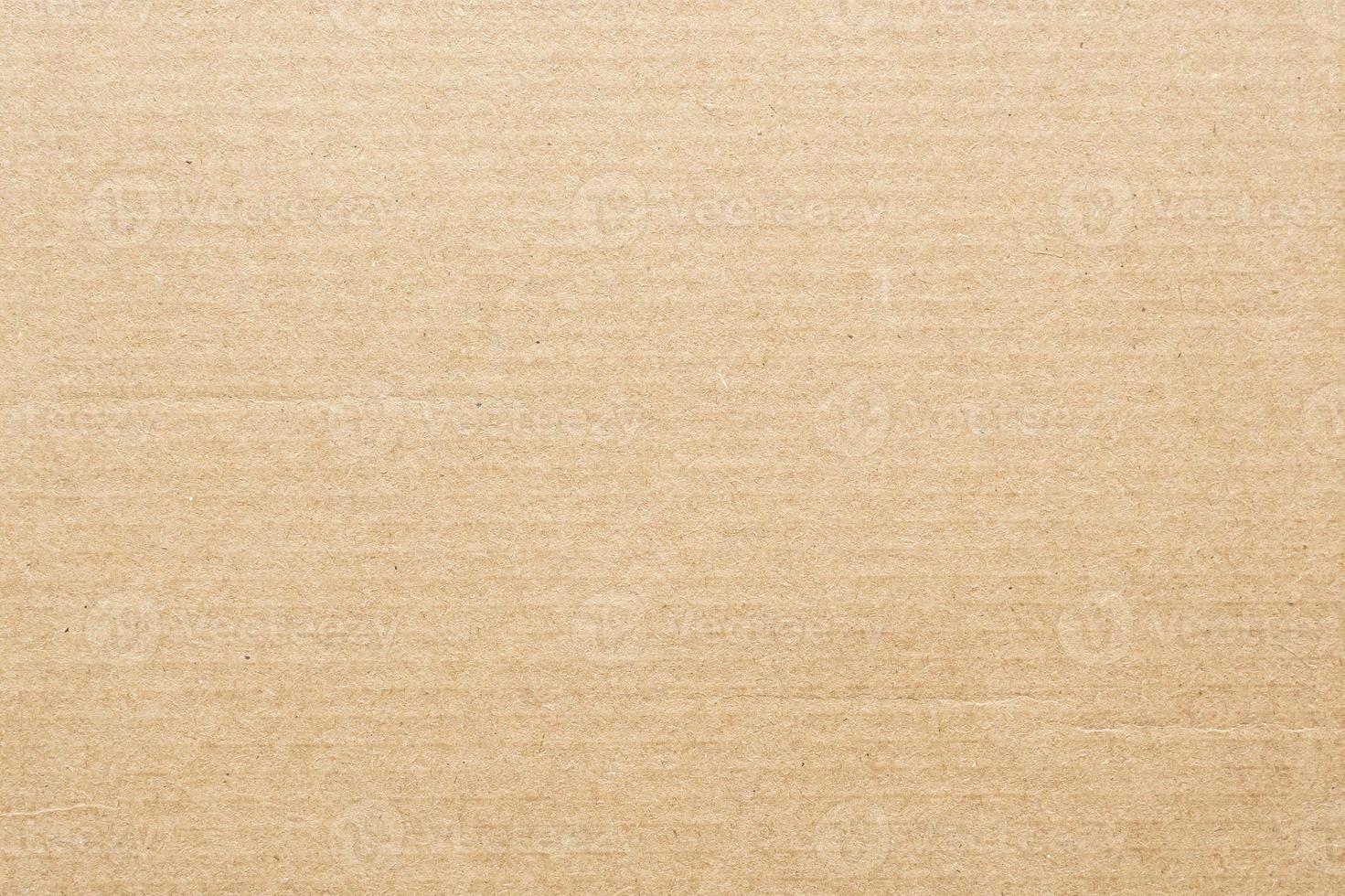 Brown eco recycled cardboard paper sheet texture background photo