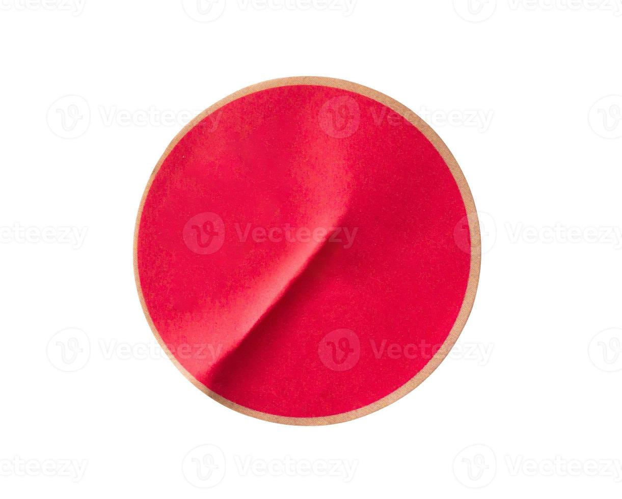 Blank red round adhesive paper sticker label isolated on white background photo