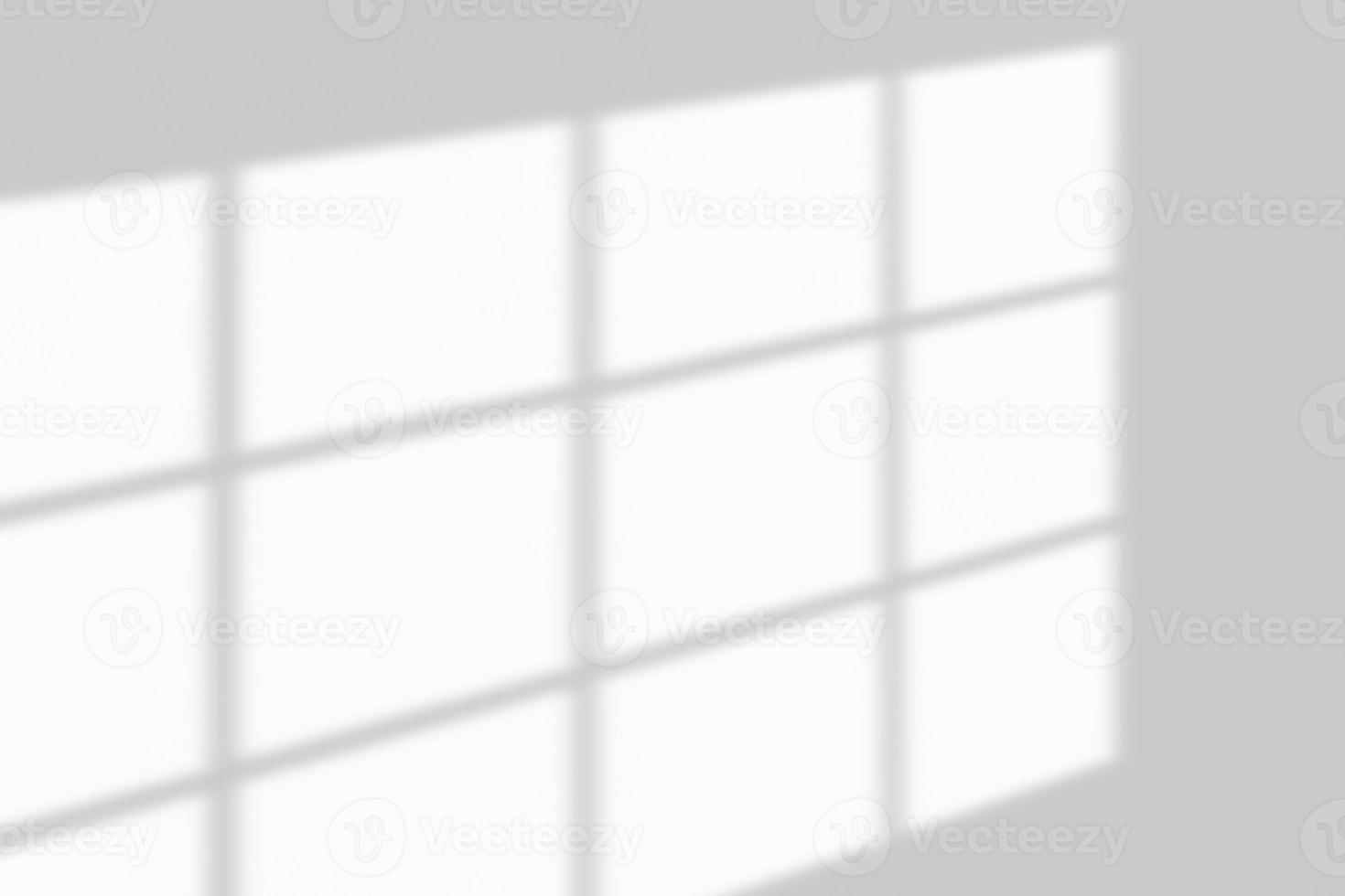 Window shadow drop on white wall background photo