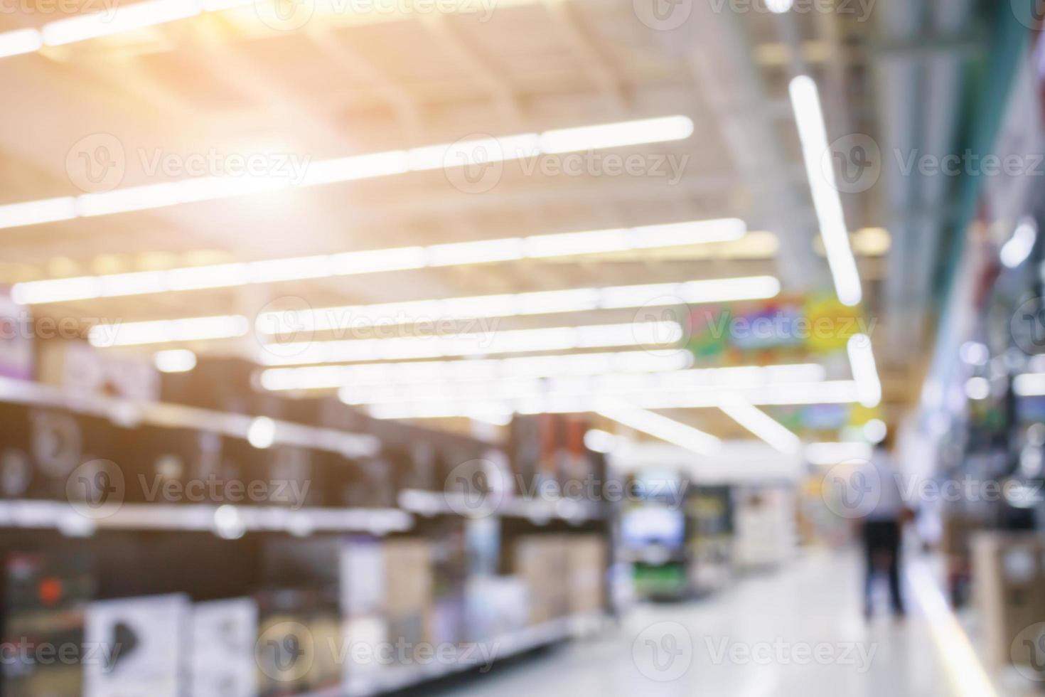 Television show in electronic department store in shopping mall blurred background photo