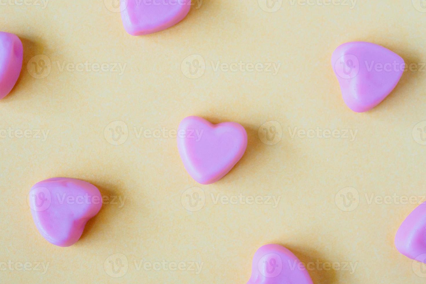Valentines day background with heart shape candy photo