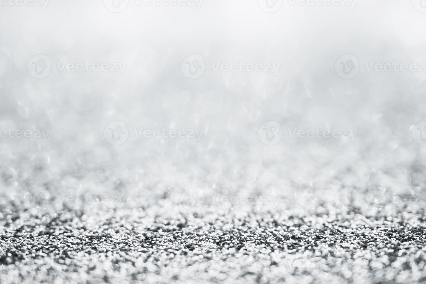 Abstract silver glitter sparkle texture with bokeh background photo