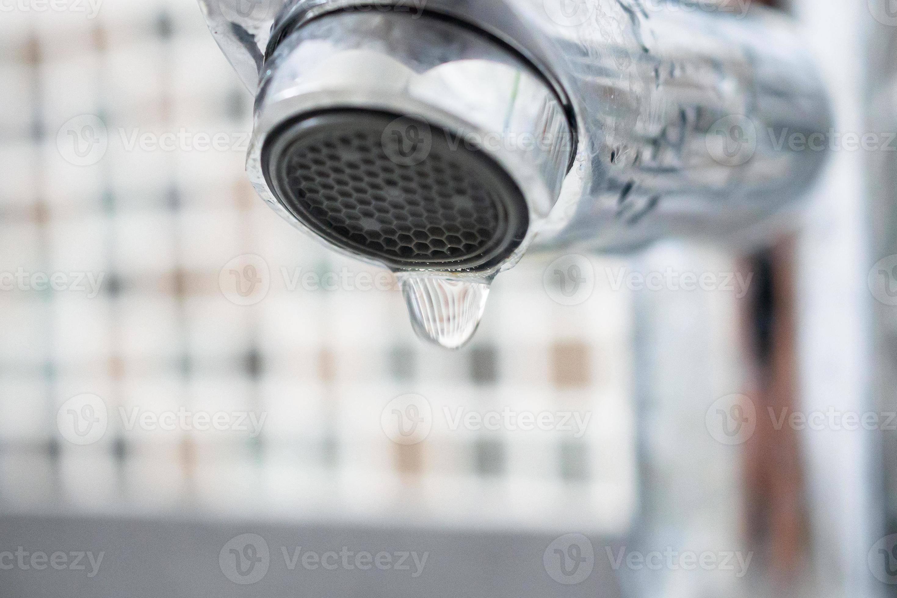 Close up faucet with water drop 12802849 Stock Photo at Vecteezy
