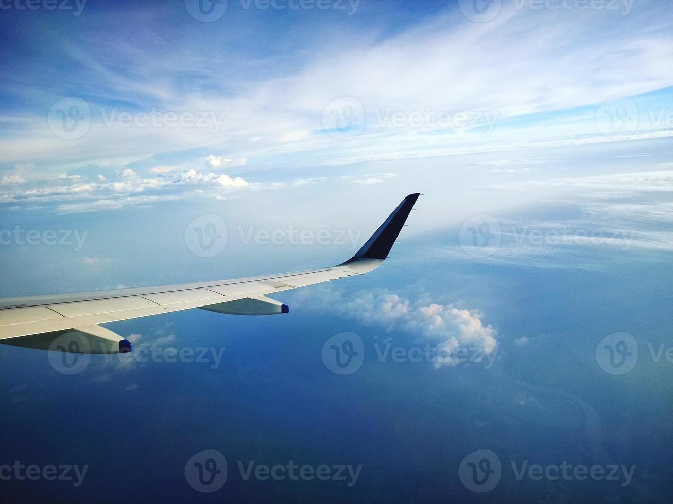 Blue sky from an airplane photo