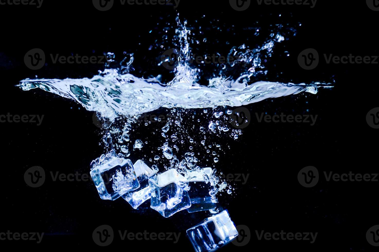 ice cubes on a black background photo