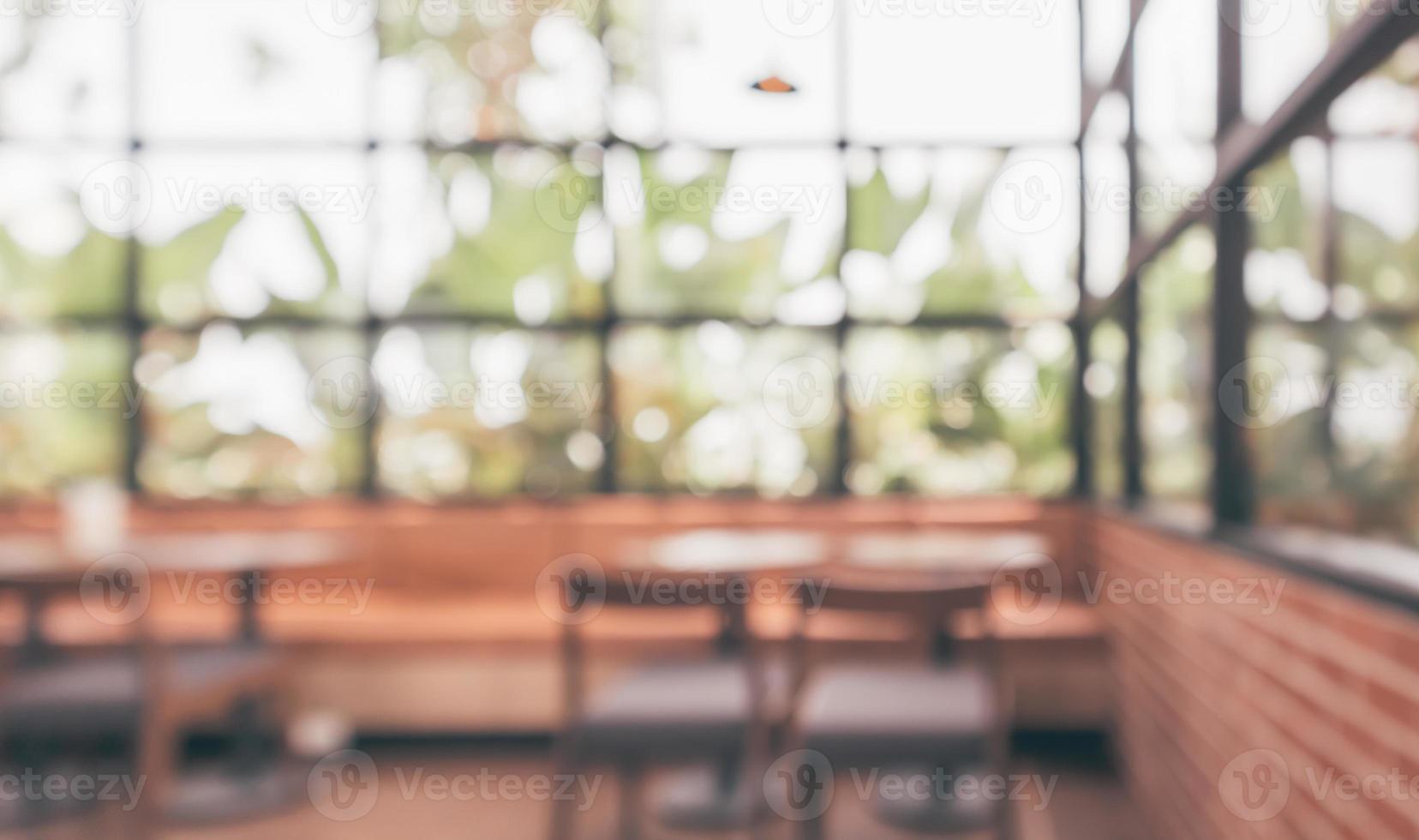 Cafe coffee shop interior abstract blur defocused with bokeh light background photo