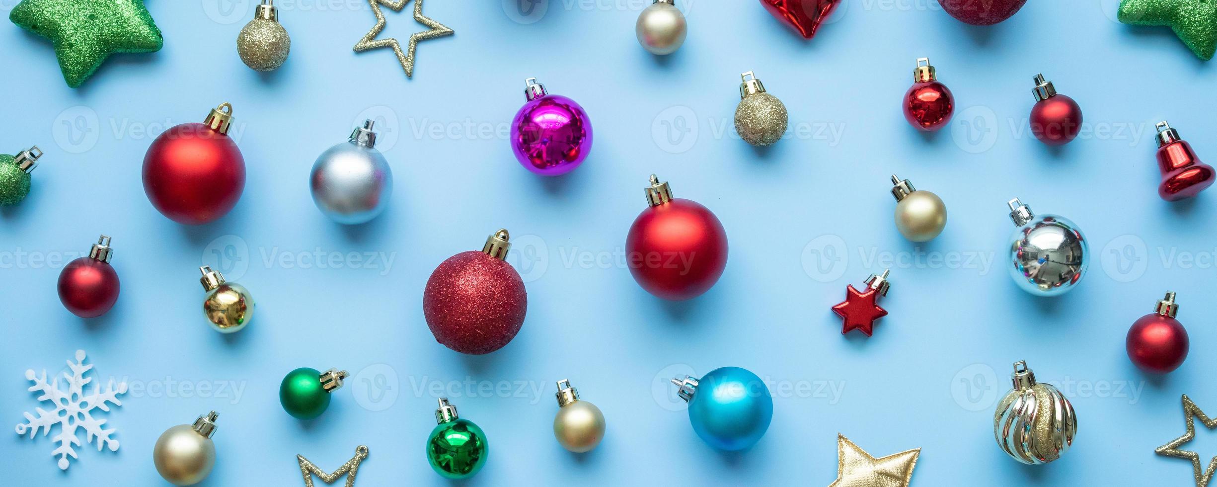 Christmas ball bauble pattern minimal flatlay on blue pastel background top view photo