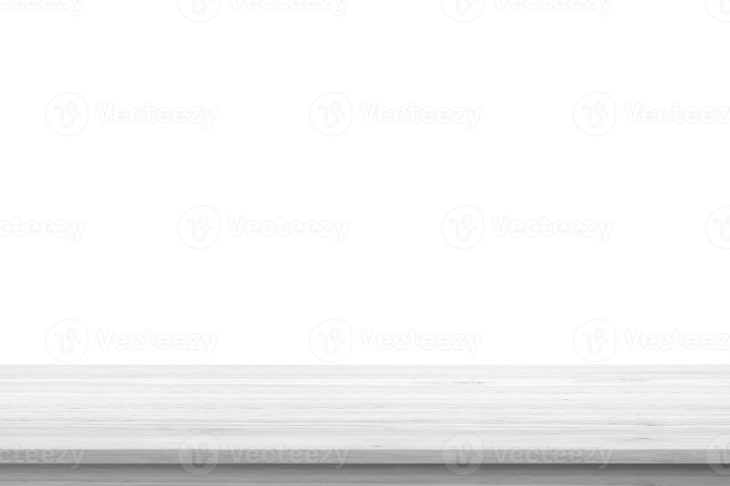 Empty white wooden table top isolated on white background photo