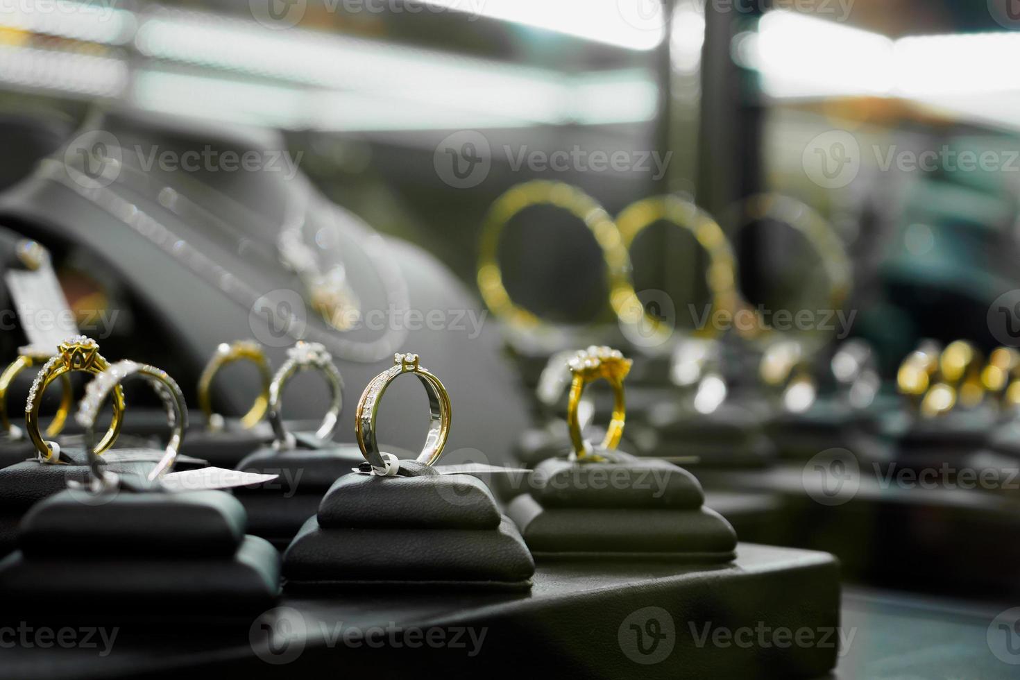 Jewelry diamond rings and necklaces show in luxury retail store window display photo
