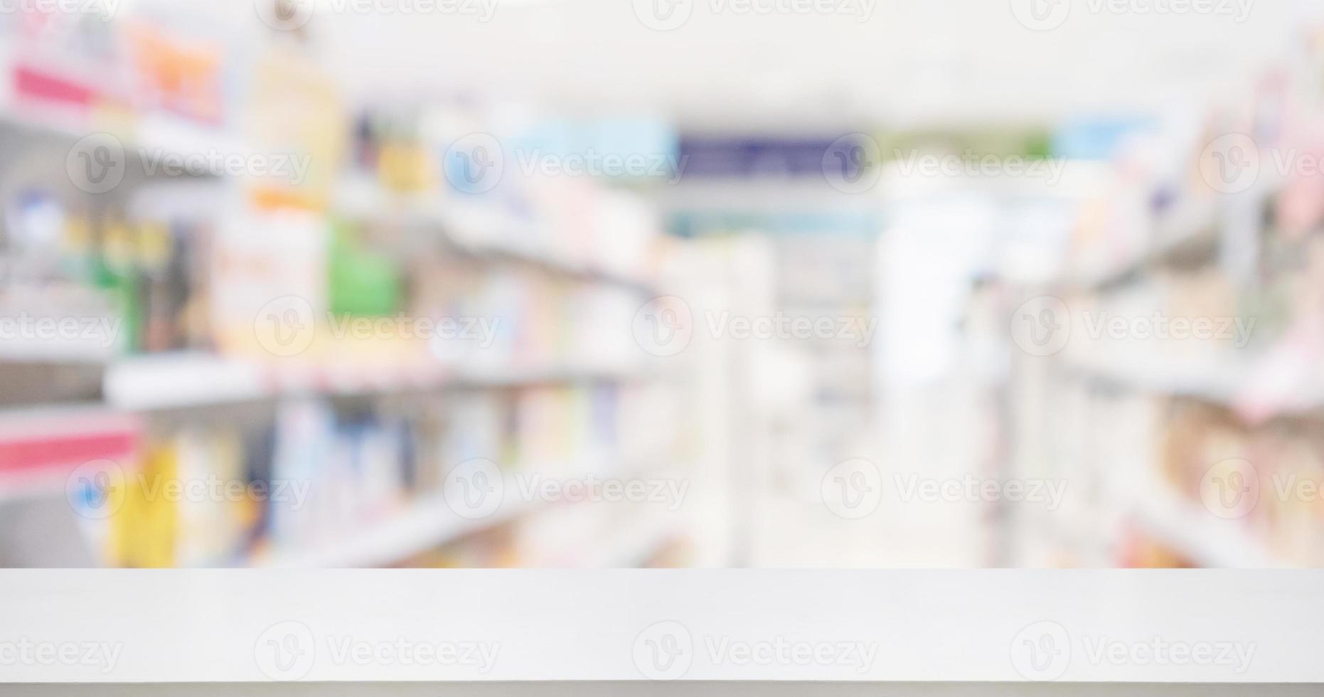 Pharmacy drugstore counter with medicine and vitamin supplement on shelves blur abstract background for montage healthcare product display photo