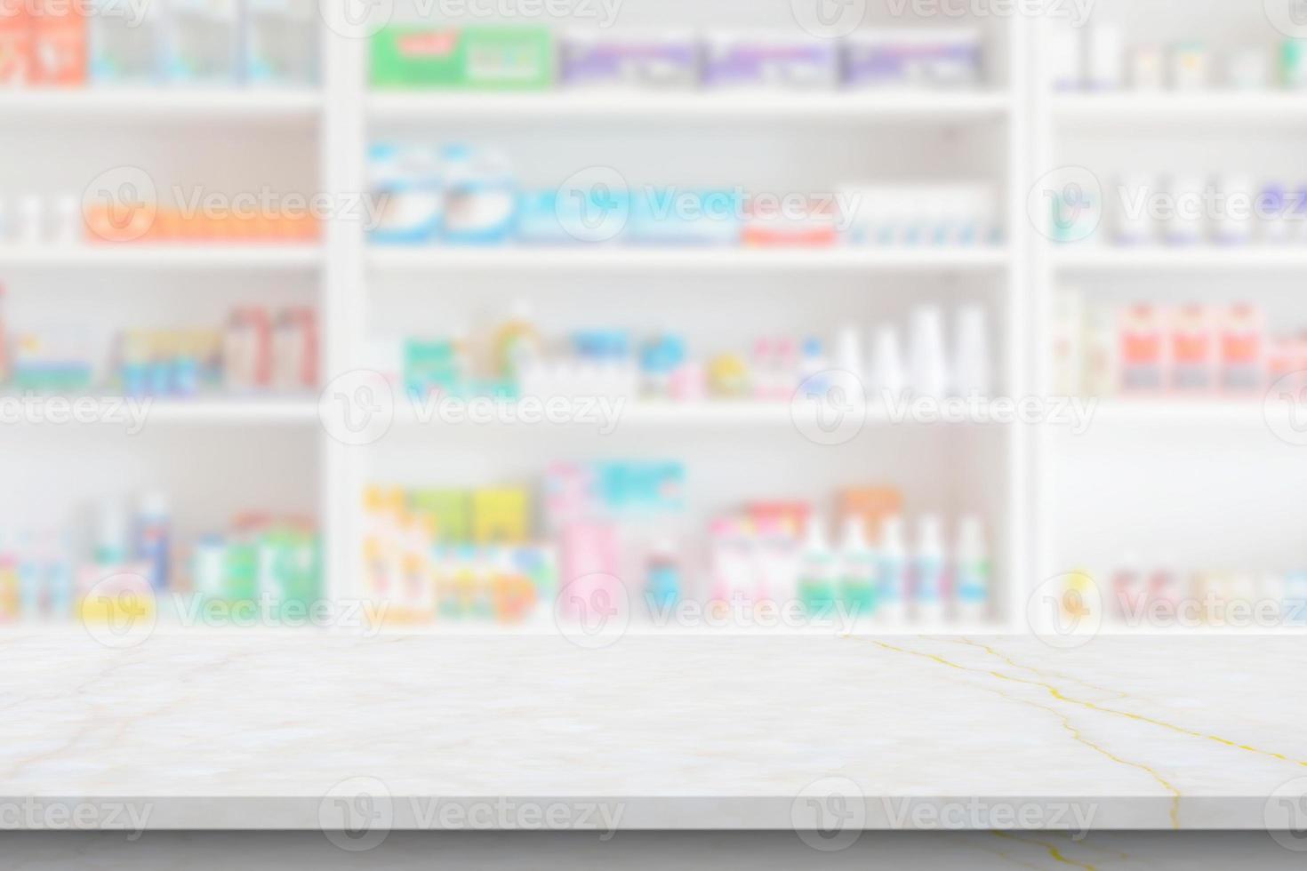 Empty white marble counter top with blur pharmacy drugstore shelves background photo